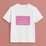 Faith-based personalised kids T-shirt with ‘Be Kind’ message in playful fonts on white tee – Keino Kids Kindness Collection