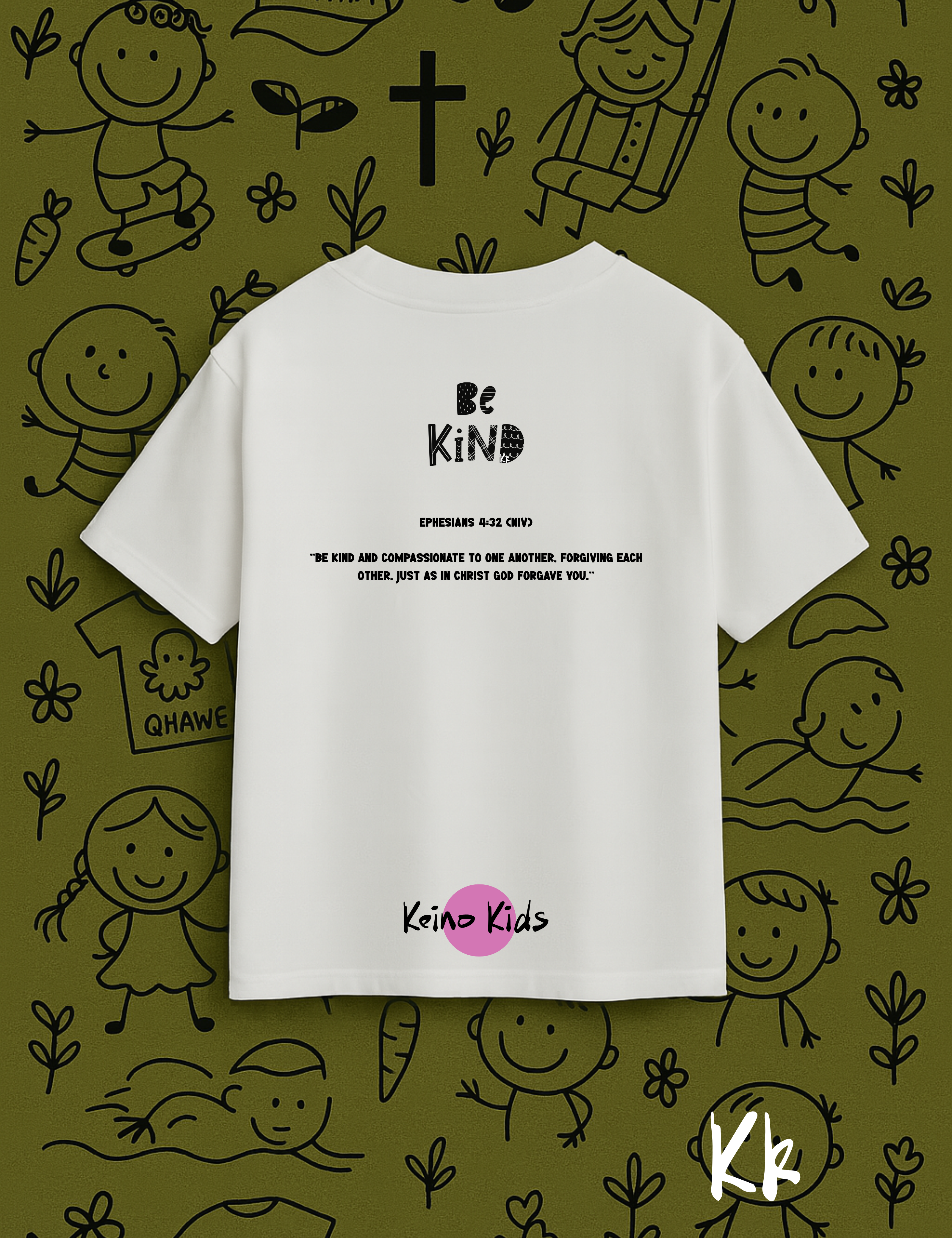 White t-shirt with 'Be Kind' text on a green background with child-like drawings