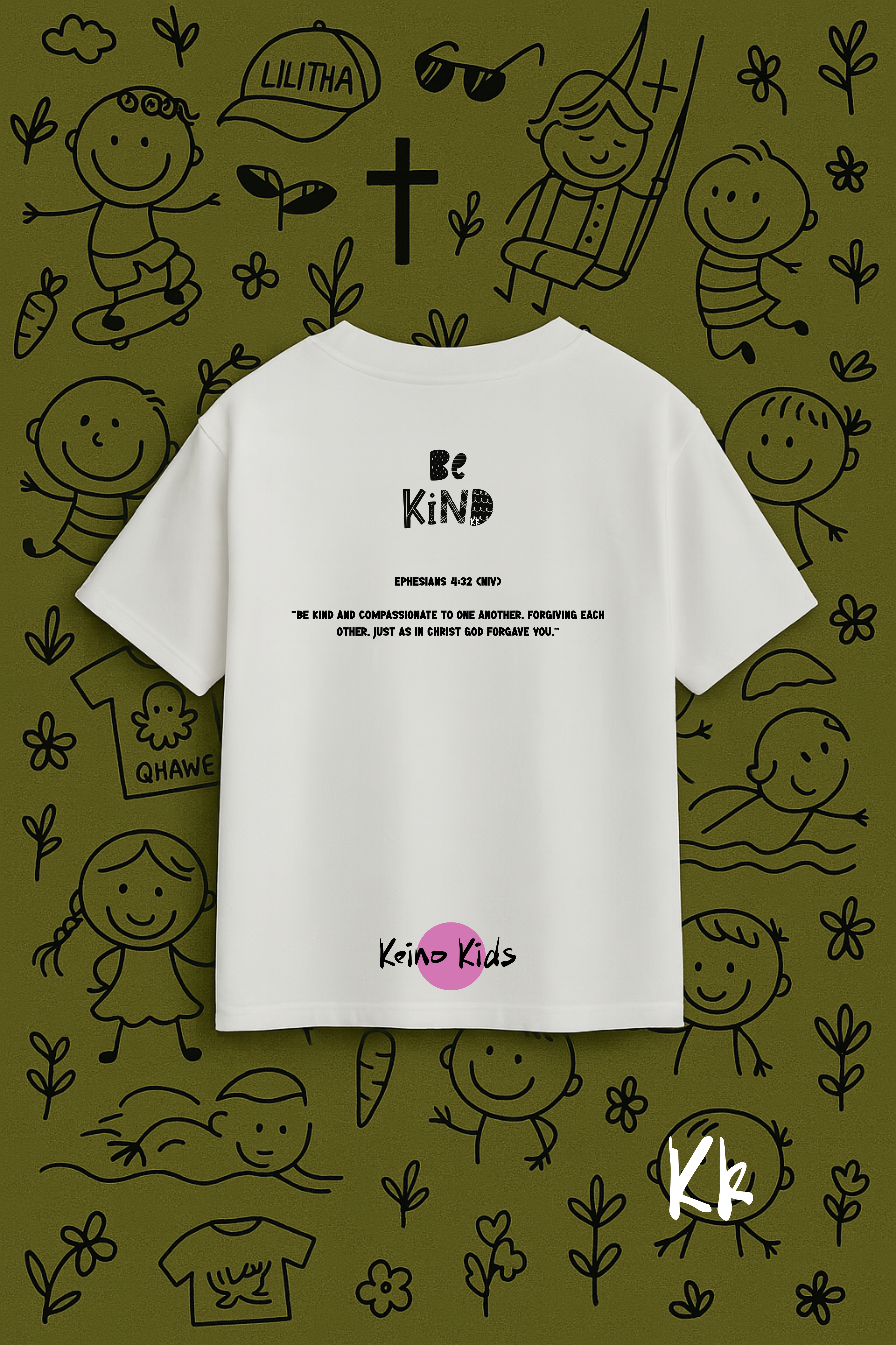 White t-shirt with 'Be Kind' text on a green background with child-like drawings