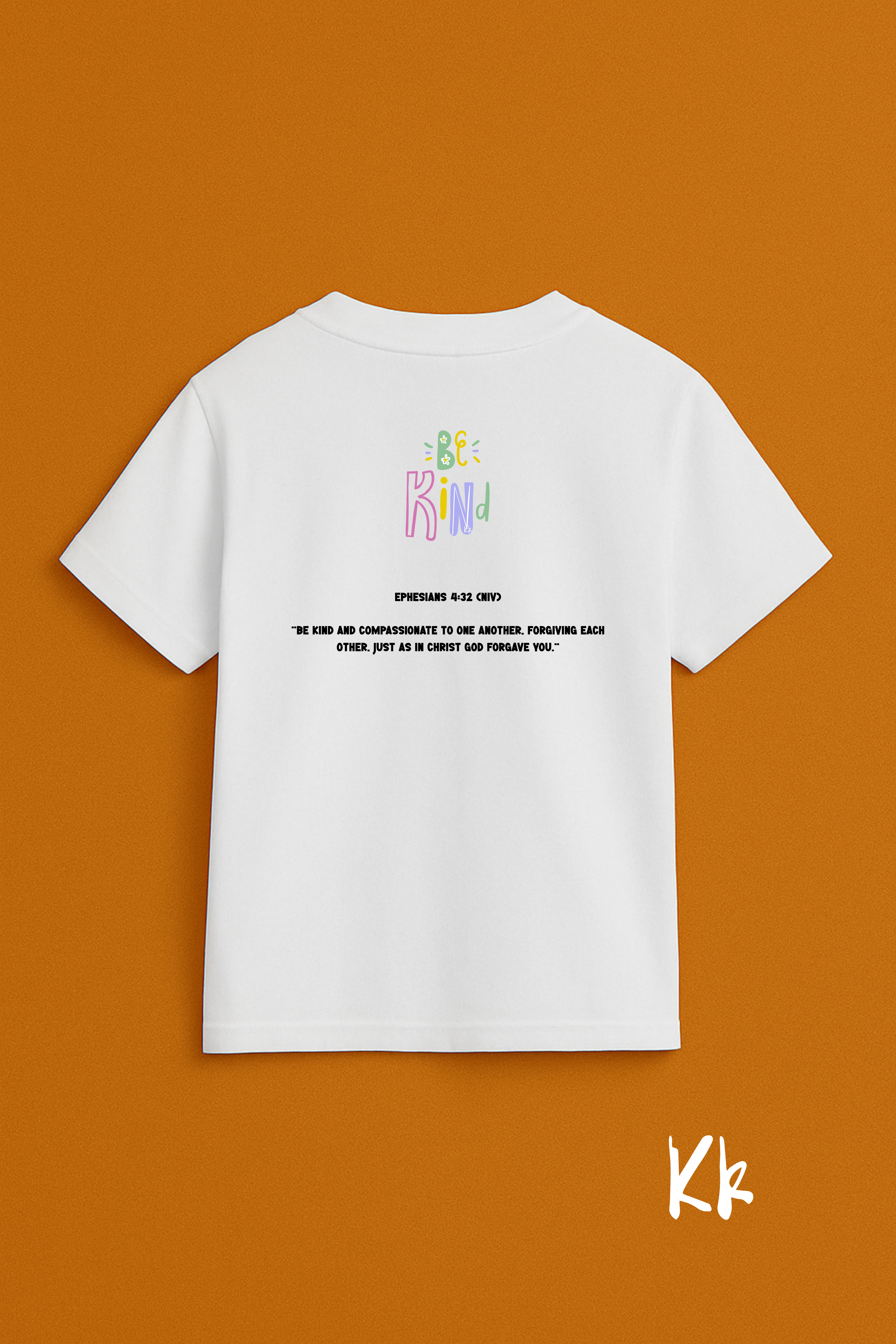 White t-shirt with colorful text on the front and black text on the back against an orange background