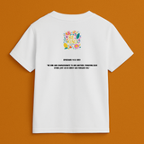 White t-shirt with colorful graphic and text on a brown background